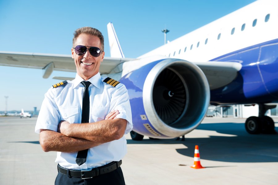 Pilot walking through airport for aviation career